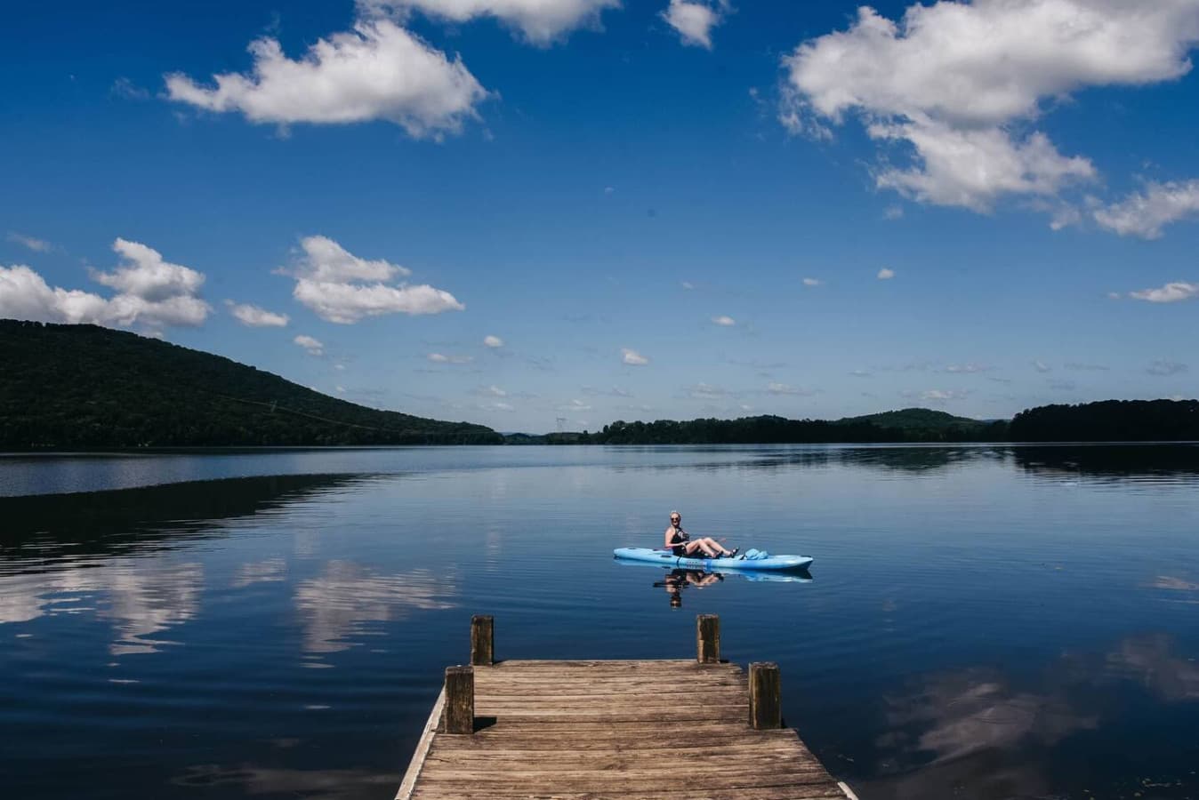 Pier lake lady on kayak landscape