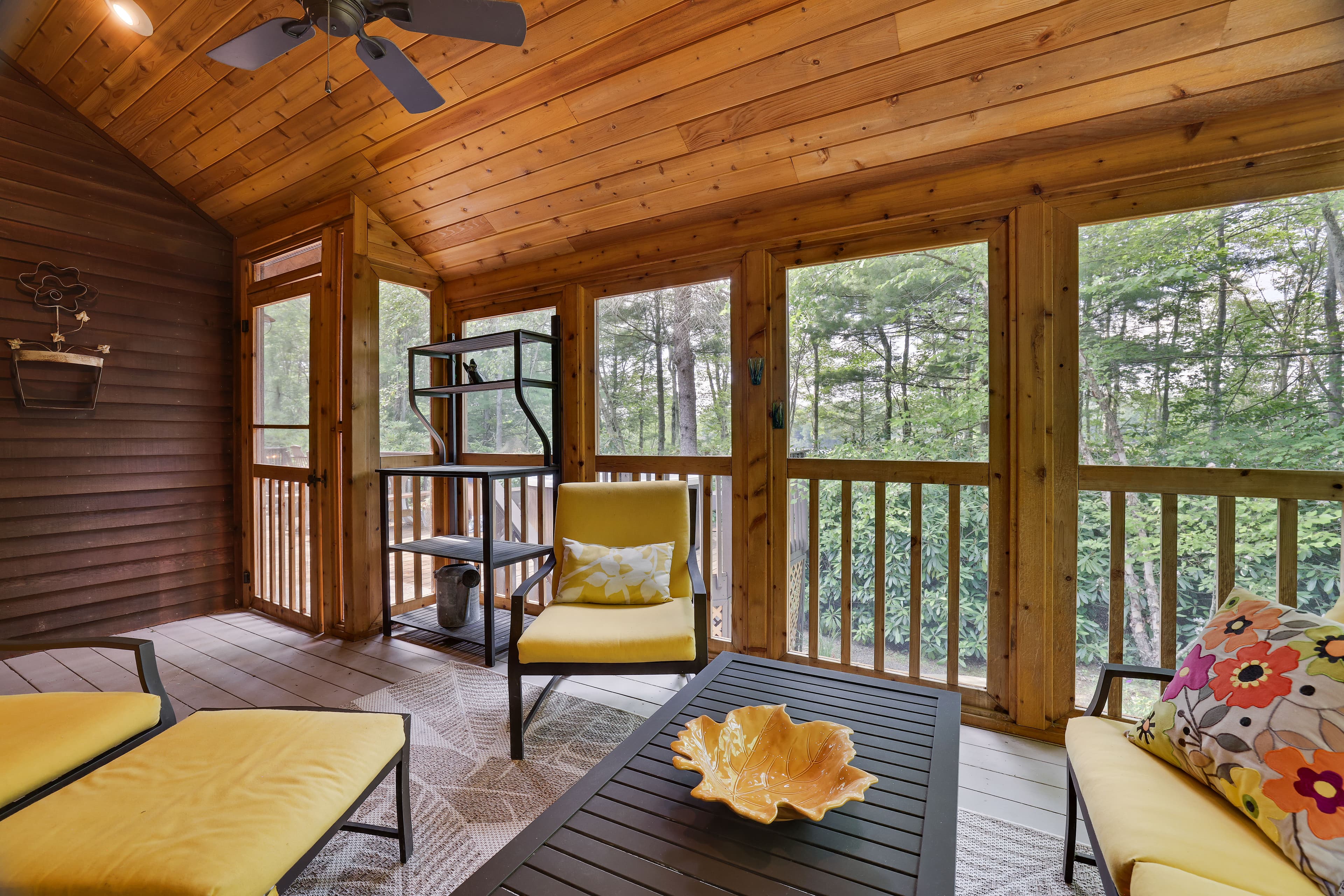 Stone and cedar screened porch