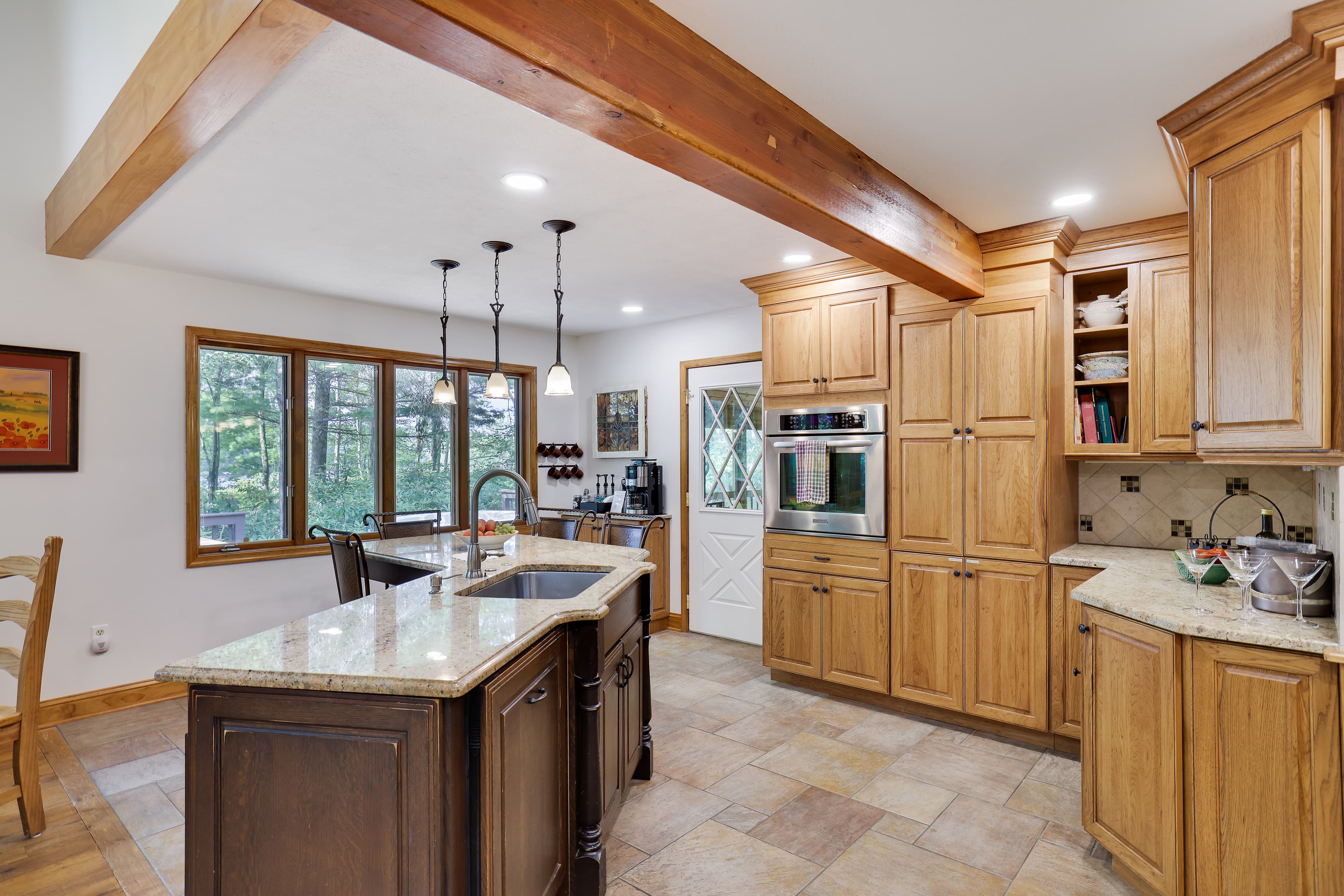 Spacious kitchen and island facing the lake