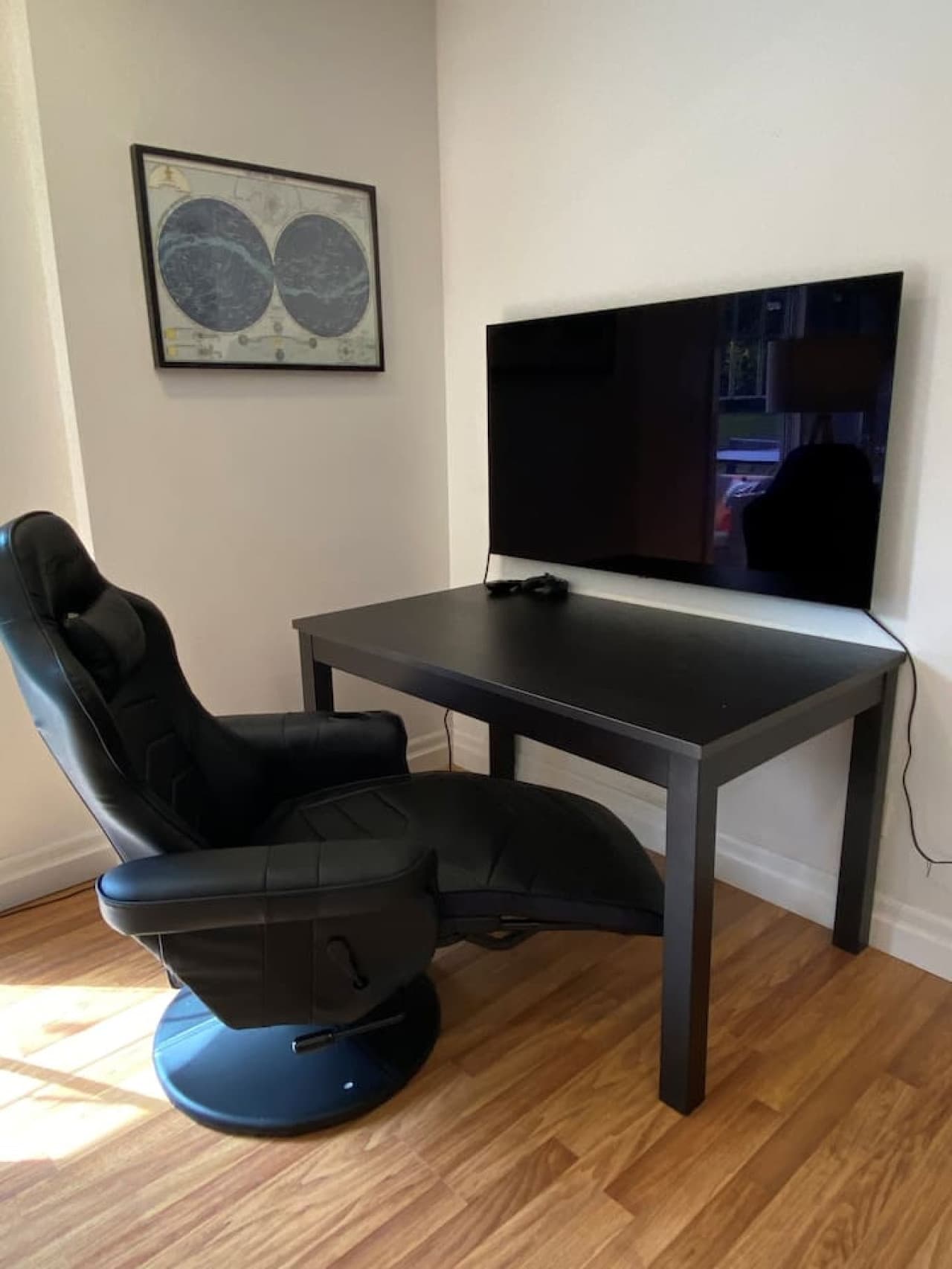 Gaming chair and monitor, lower level in rec room