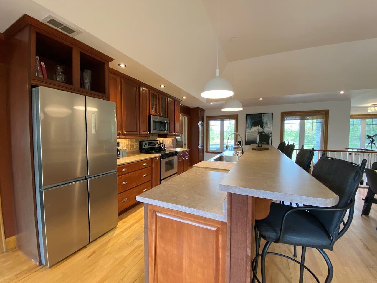 Fully equipped kitchen with stainless steel appliances, breakfast counter, drip coffee maker, dishwasher and everything else you'll need to cook up your favorites!