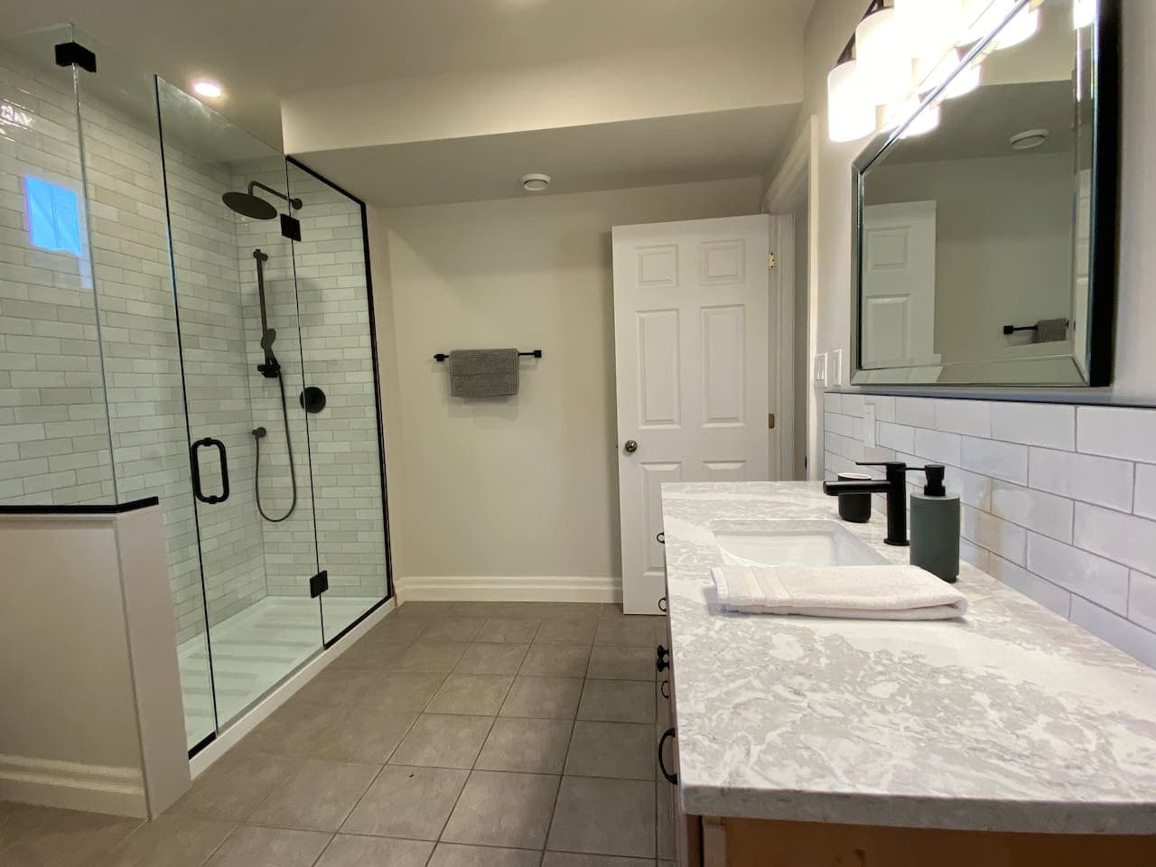 Full large bathroom on lower level. Large walk-in shower, vanity and toilet