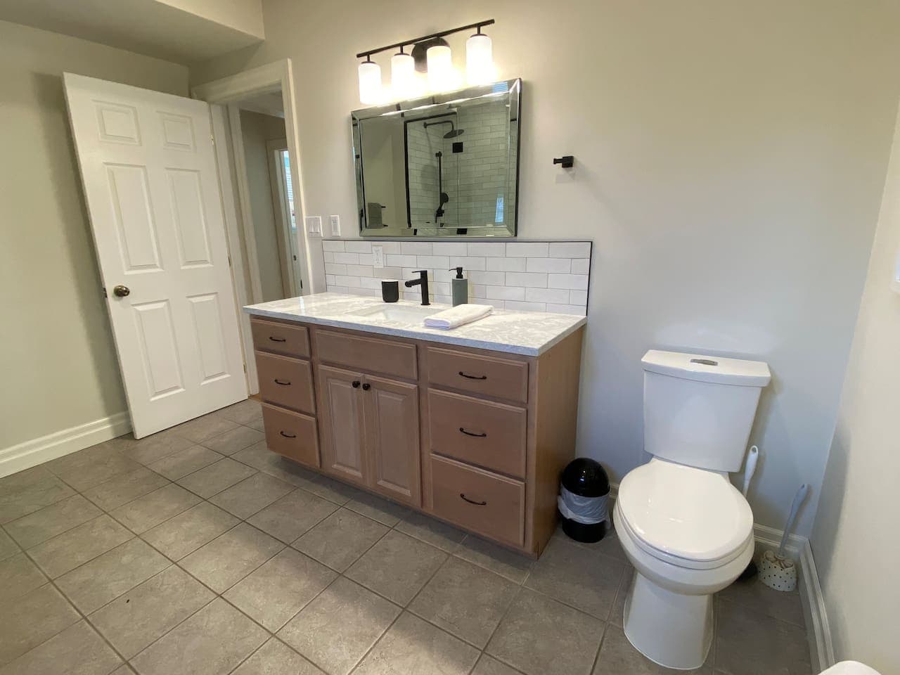 Full large bathroom on lower level. Large walk-in shower, vanity and toilet