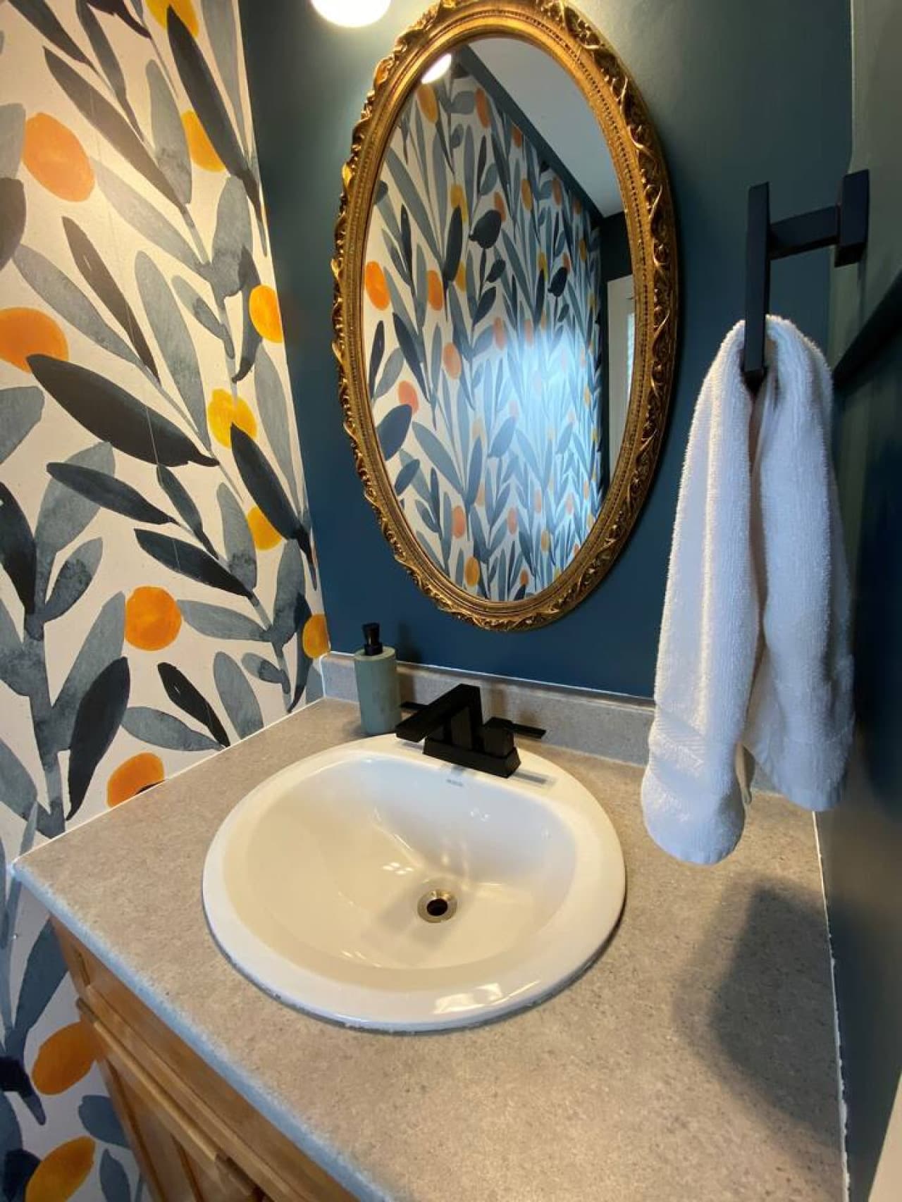 Powder room (sink and toilet) conveniently located on the main level, just in from the deck entry.