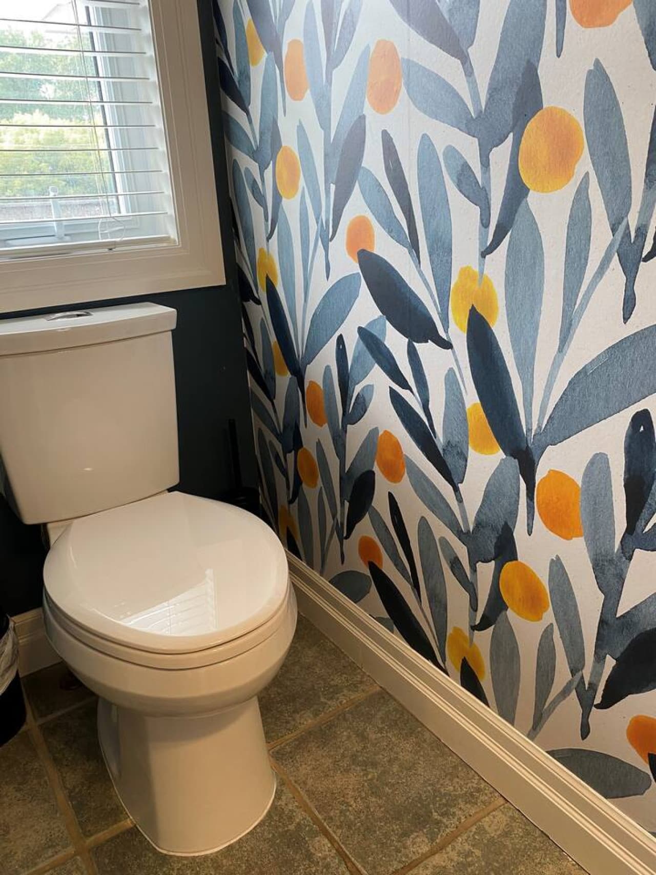 Powder room (sink and toilet) conveniently located on the main level, just in from the deck entry.