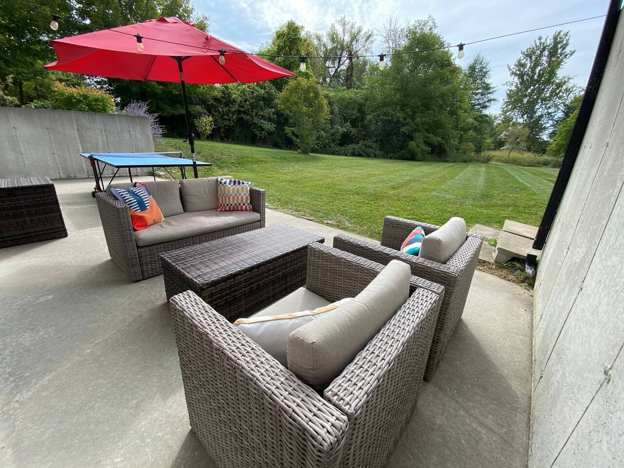 Patio just off of the lower level rec room. Play some ping pong!