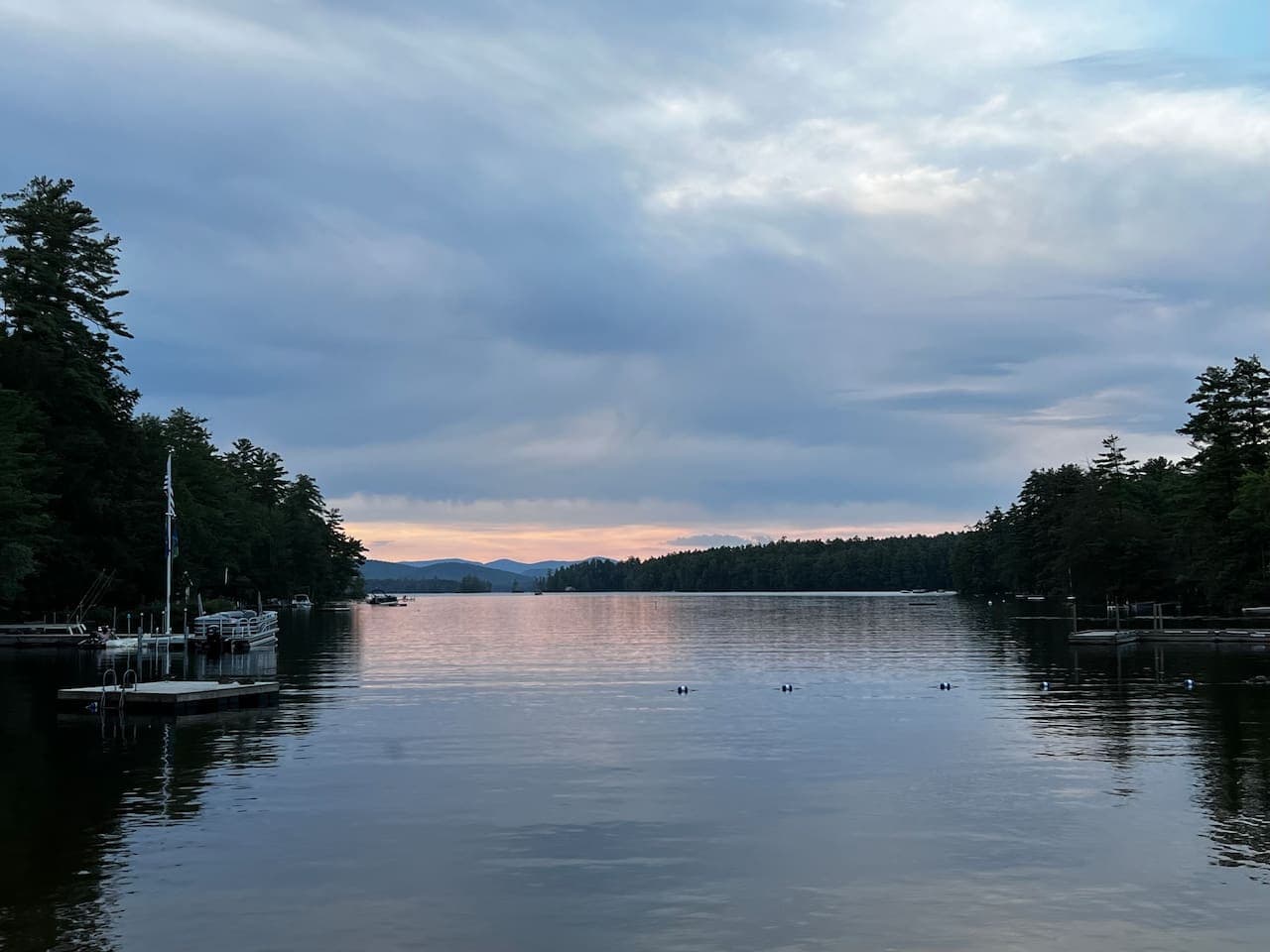 Sunset over Highland lake, a 5 minute walk from the house. Complete with a small sandy beach, picnic tables, and playground the lake is a great place to spend the day or watch the sunset at night