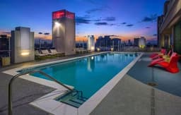 Downtown High‑Rise w/ Skyline Views & Rooftop pool