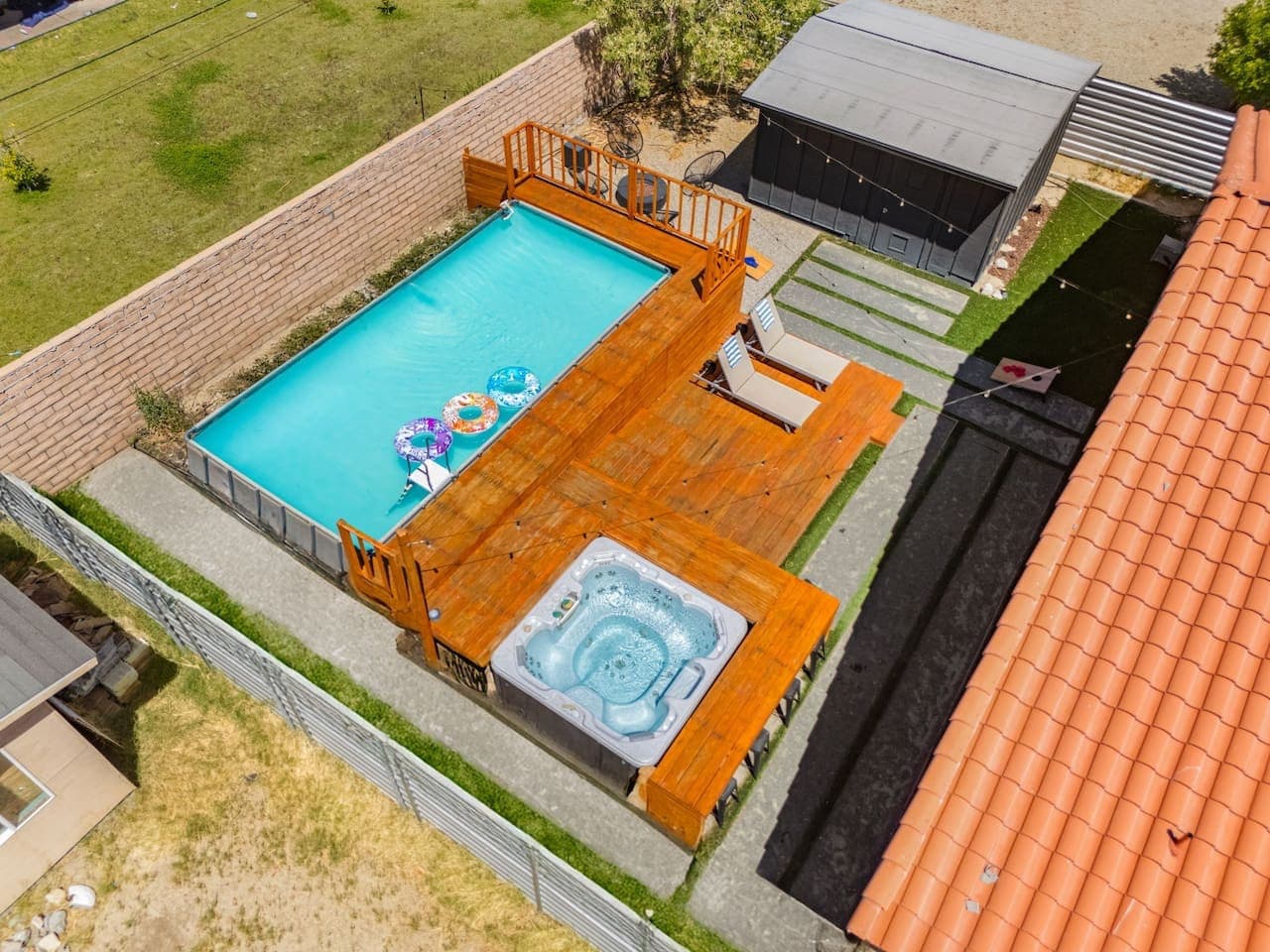 Boho Bungalow: with above ground pool, hot tub, firepit & games in Desert Hot Springs by Rather Be Properties