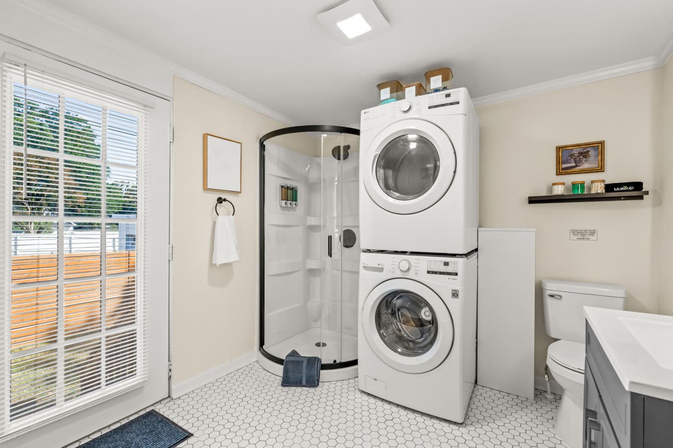 Convenient laundry area w/ stacked washer & dryer, making longer stays easy and stress-free.