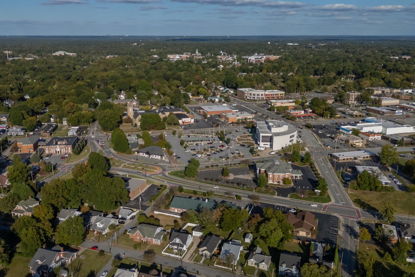Aerial neighborhood view showing the surrounding area & local streets from above.