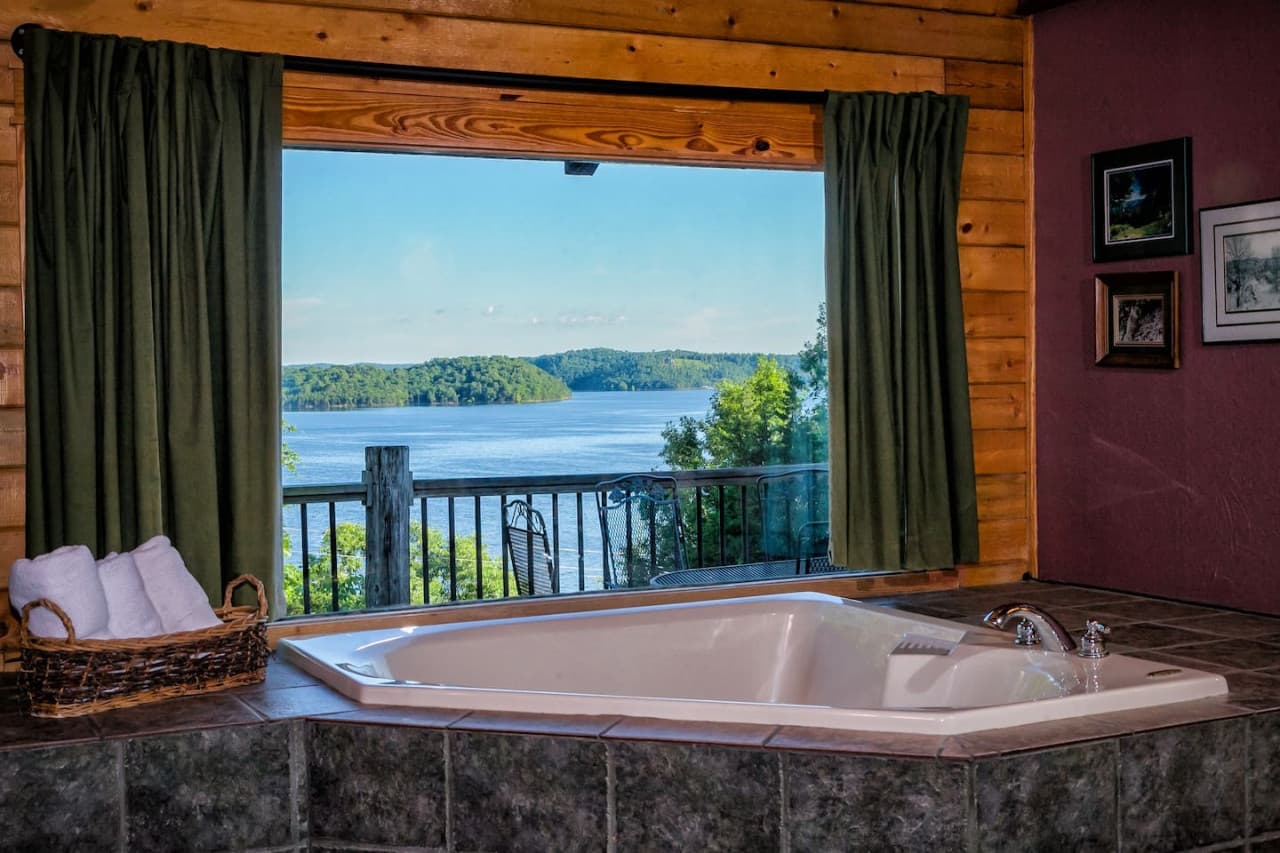 Master Bathroom with Large Jacuzzi and lake view.