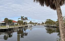 Cozy 3 Bedroom  Home on a Deep Canal with a pool near Fisherman's Village