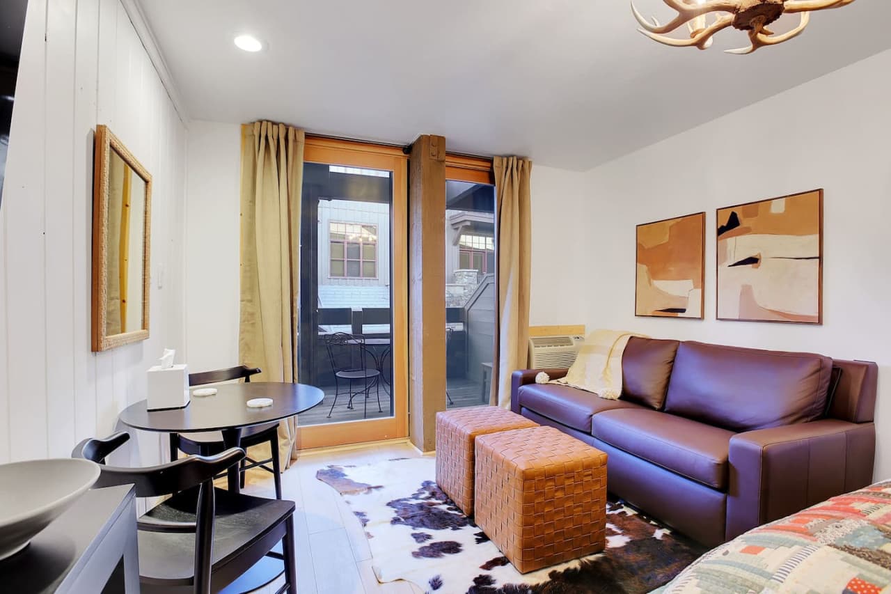 Main living area with a queen American Leather sofa sleeper and upgraded gel mattress (medium~ firmness).