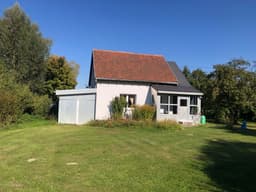 auf einem Gutshof mit eigenem Garten in ländlicher Umgebung