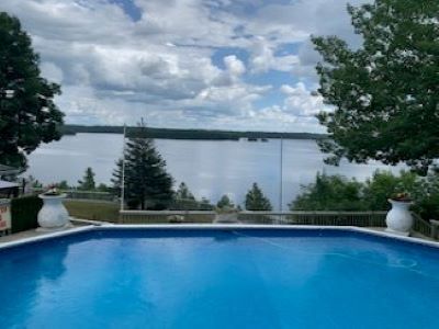 Lake Front Cozy Cottage with Outdoor Saltwater Pool Overlooking Upper Rideau Lake